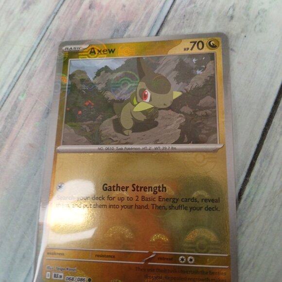 Axew Reverse Holo Pokeball - Picture 2 of 4
